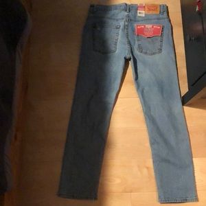 Brand new levis jeans size 14h 33 by 28